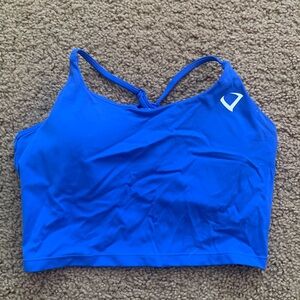 Violate the Dress Code bright blue workout top